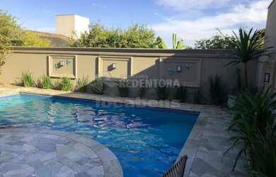 Imagem: A casa em condomínio possui 4 Dormitórios, 5 Banheiros, 4