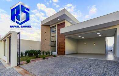 Imagem: A casa possui 3 Dormitórios, 5 Banheiros, 3 Vagas na garagem