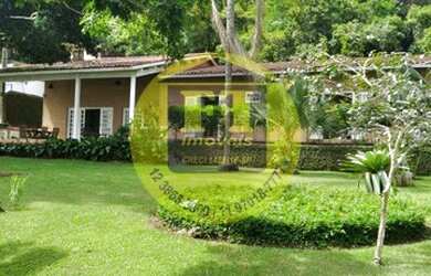 Imagem: A casa possui 3 Dormitórios, 4 Banheiros, 4 Vagas na garagem