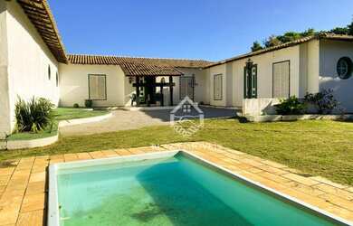 Imagem: A casa possui 5 Dormitórios, 5 Banheiros, 5 Vagas na garagem