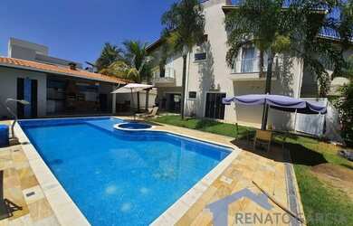 Imagem: A casa em condomínio possui 5 Dormitórios, 5 Banheiros, 5