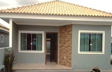 Imagem: A casa possui 3 Dormitórios, 1 Banheiro, 2 Vagas na garagem