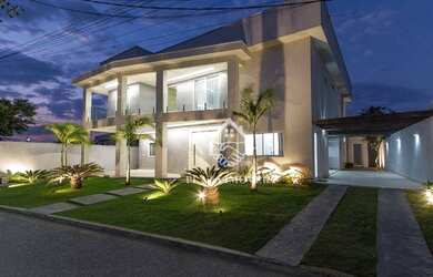 Imagem: A casa em condomínio possui 5 Dormitórios, 5 Banheiros, 2