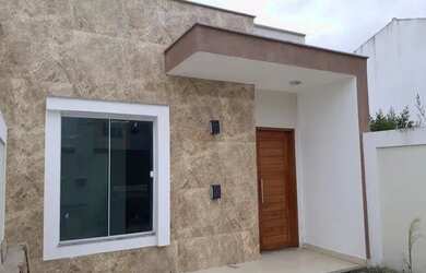 Imagem: A casa possui 2 Dormitórios, 2 Banheiros e 2 Vagas na garagem