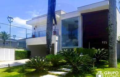 Imagem: A casa em condomínio possui 5 Dormitórios, 5 Banheiros, 2