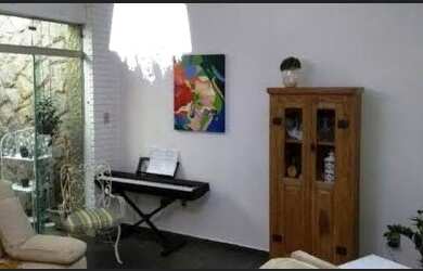 Imagem: A casa possui 3 Dormitórios, 4 Banheiros, 2 Vagas na garagem