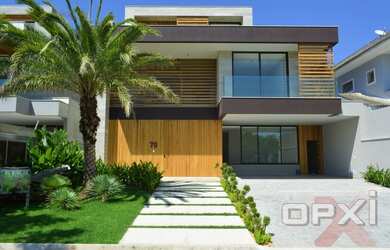 Imagem: A casa em condomínio possui 5 Dormitórios, 5 Banheiros, 4