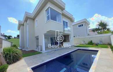 Imagem: A casa em condomínio possui 4 Dormitórios, 5 Banheiros, 5