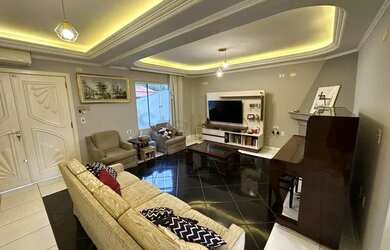 Imagem: A casa possui 5 Dormitórios, 4 Banheiros, 3 Vagas na garagem