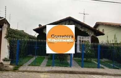 Imagem: A casa possui 3 Dormitórios, 2 Banheiros, 2 Vagas na garagem