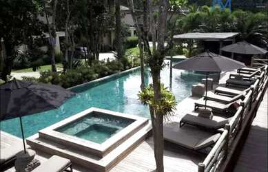 Imagem: A casa possui 4 Dormitórios, 2 Banheiros, 3 Vagas na garagem