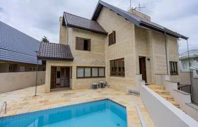 Imagem: A casa em condomínio possui 4 Dormitórios, 5 Banheiros, 3