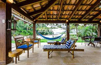 Imagem: A casa possui 5 Dormitórios, 5 Banheiros, 5 Vagas na garagem