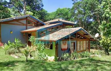 Imagem: A casa possui 3 Dormitórios, 3 Banheiros, 3 Vagas na garagem