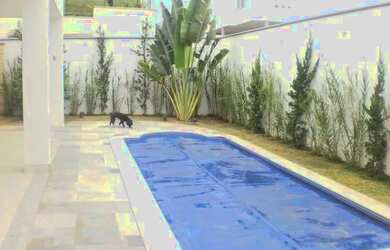 Imagem: A casa em condomínio possui 4 Dormitórios, 5 Banheiros, 2