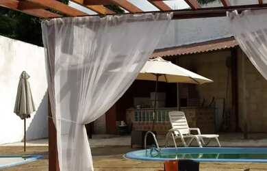 Imagem: A casa em condomínio possui 3 Dormitórios, 4 Banheiros, 5