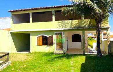 Imagem: A casa possui 4 Dormitórios, 4 Banheiros, 5 Vagas na garagem