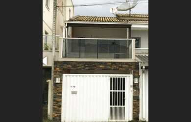 Imagem: A casa possui 2 Dormitórios, 3 Banheiros, 2 Vagas na garagem