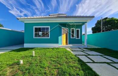 Imagem: A casa possui 3 Dormitórios, 3 Banheiros, 4 Vagas na garagem