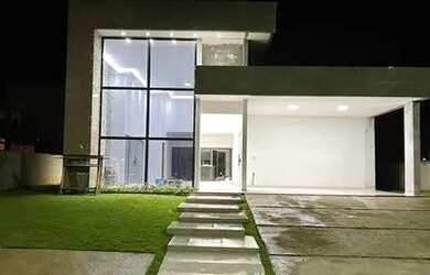 Imagem: A casa possui 3 Dormitórios, 5 Banheiros, 2 Vagas na garagem