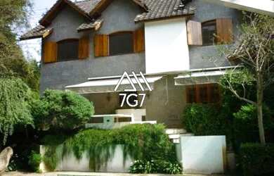 Imagem: A casa possui 5 Dormitórios, 5 Banheiros, 4 Vagas na garagem