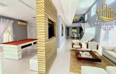 Imagem: A casa possui 5 Dormitórios, 5 Banheiros, 4 Vagas na garagem