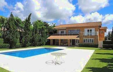 Imagem: A casa possui 4 Dormitórios, 5 Banheiros, 5 Vagas na garagem