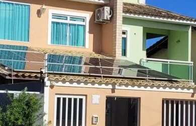 Imagem: A casa possui 3 Dormitórios, 3 Banheiros, 3 Vagas na garagem