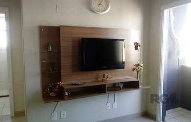 Imagem: O apartamento possui 2 Dormitórios, 1 Banheiro, 1 Vaga na garagem