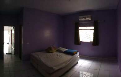 Imagem: A casa possui 3 Dormitórios, 4 Banheiros, 2 Vagas na garagem