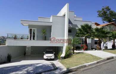 Imagem: A casa em condomínio possui 4 Dormitórios, 4 Banheiros, 3