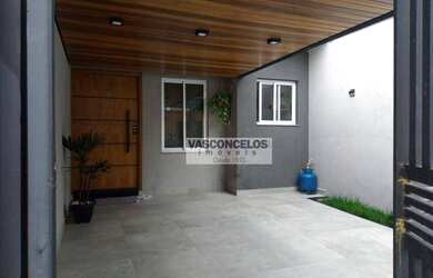 Imagem: A casa possui 3 Dormitórios, 2 Banheiros, 2 Vagas na garagem