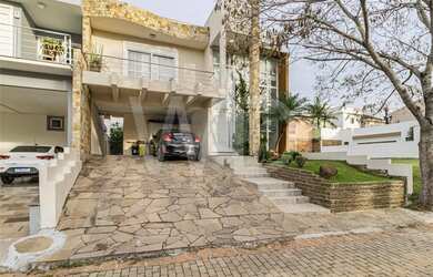 Imagem: A casa em condomínio possui 3 Dormitórios, 3 Banheiros, 2