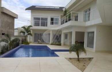 Imagem: A casa em condomínio possui 4 Dormitórios, 5 Banheiros, 5