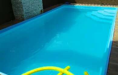 Imagem: A casa possui 3 Dormitórios, 4 Banheiros, 3 Vagas na garagem