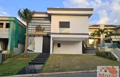 Imagem: A casa em condomínio possui 5 Dormitórios, 5 Banheiros, 5