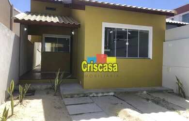 Imagem: A casa possui 3 Dormitórios, 2 Banheiros, 1 Vaga na garagem