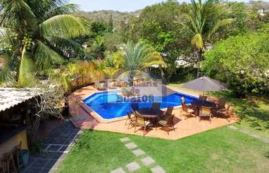 Imagem: A casa possui 5 Dormitórios, 5 Banheiros, 5 Vagas na garagem