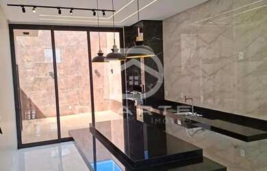 Imagem: A casa possui 3 Dormitórios, 3 Banheiros, 2 Vagas na garagem