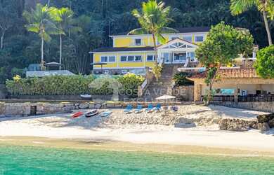 Imagem: A casa em condomínio possui 5 Dormitórios, 5 Banheiros, 5