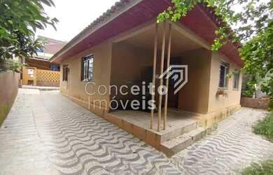 Imagem: A casa possui 3 Dormitórios, 1 Banheiro, 1 Vaga na garagem