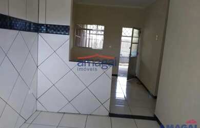 Imagem: A casa possui 2 Dormitórios, 1 Banheiro, 2 Vagas na garagem