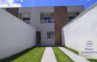 Imagem: A casa possui 2 Dormitórios, 3 Banheiros, 2 Vagas na garagem