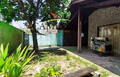 Imagem: A casa possui 3 Dormitórios, 1 Banheiro, 3 Vagas na garagem