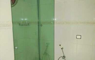 Imagem: A casa possui 3 Dormitórios, 3 Banheiros, 4 Vagas na garagem