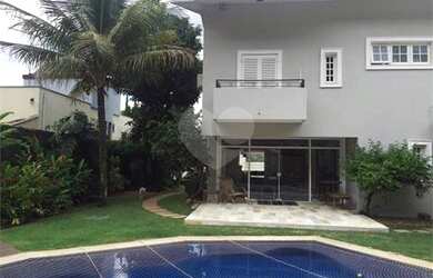 Imagem: A casa em condomínio possui 4 Dormitórios, 5 Banheiros, 4