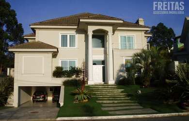 Imagem: A casa em condomínio possui 4 Dormitórios, 5 Banheiros, 5