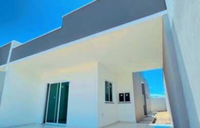 Imagem: A casa possui 2 Dormitórios, 2 Banheiros, 2 Vagas na garagem