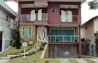 Imagem: A casa em condomínio possui 4 Dormitórios, 5 Banheiros, 4