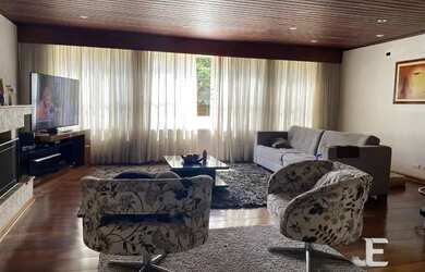 Imagem: A casa possui 3 Dormitórios, 5 Banheiros, 5 Vagas na garagem